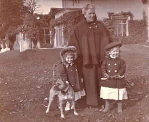 The three-year-old cousins, Irene Phipps-Hornby (left) and Valerie Jay (right) shown in the grounds of Blendon in 1898, accompanied by their nurse